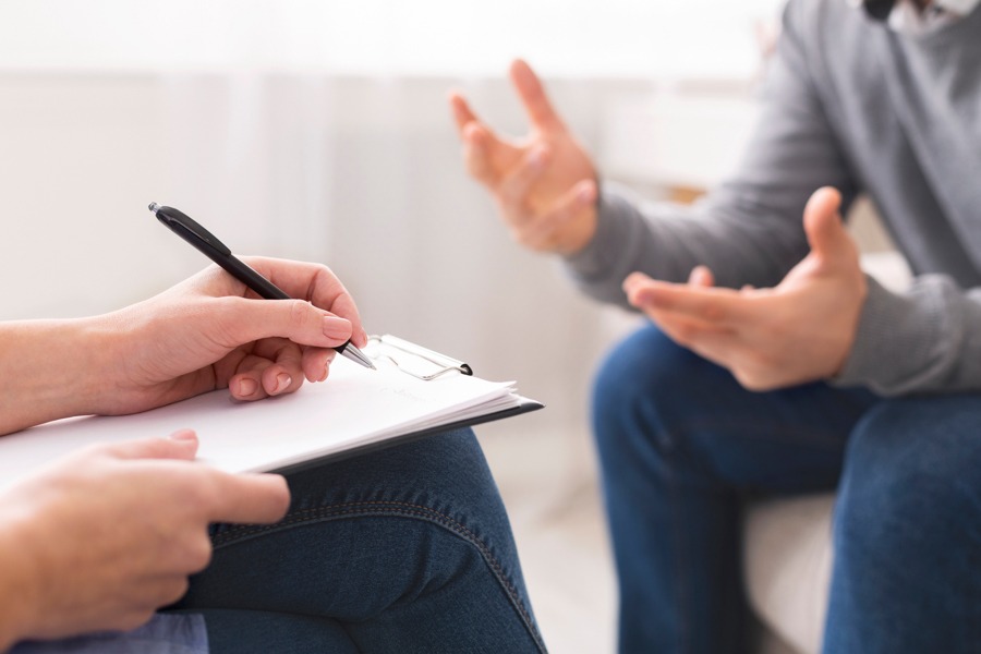 a man talking to his therapist during individual therapy