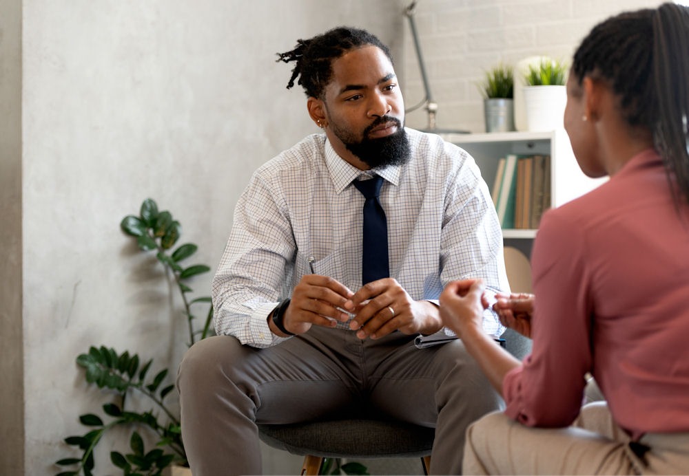 a therapist talking to her patient during therapy